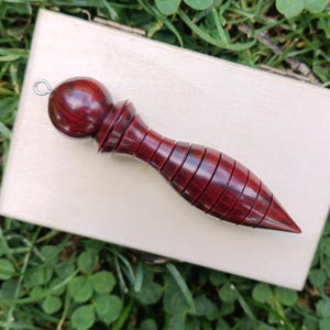 Gorgeous red sandalwood Agape 12 rings pendulum 9x1.9 centimeters, 22 grams