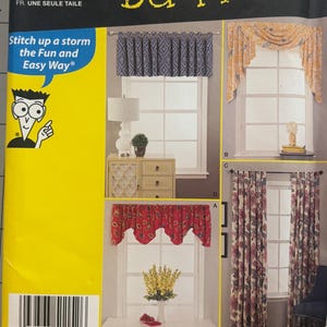 May include: Simplicity 1152 Window Treatments Sewing Patterns for Dummies envelope featuring illustrations of various curtain styles including valances and drapes with blue, yellow, and red patterns. The package includes text and a barcode.