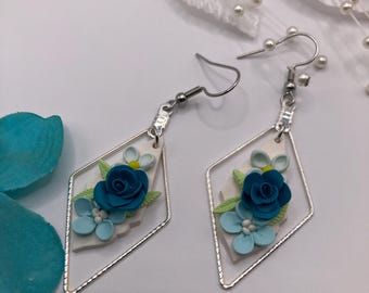 Handcrafted Blue Rose Polymer Clay Earrings: Framed Floral Dangles in Blue and White