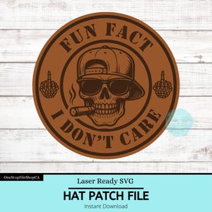 May include: A brown circular patch with the text "FUN FACT I DON'T CARE" surrounding a skull wearing sunglasses and a backwards baseball cap, smoking a cigar. The patch also features two middle finger hand gestures. The bottom of the image reads "HAT PATCH FILE".