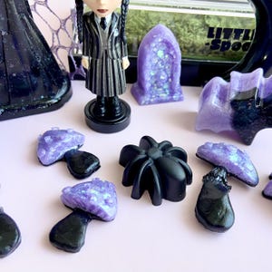 Handmade magnetic mushroom décor for gothic jumping spider enclosure with waterproof resin decorations.