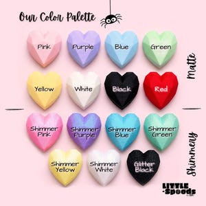 Jumping spider hide color chart showing matte and shimmer color options for little spoods jumping spider decor. Colors are displayed in heart shapes and include pastel pink, purple, blue, green, yellow, white, black, red and glitter colors
