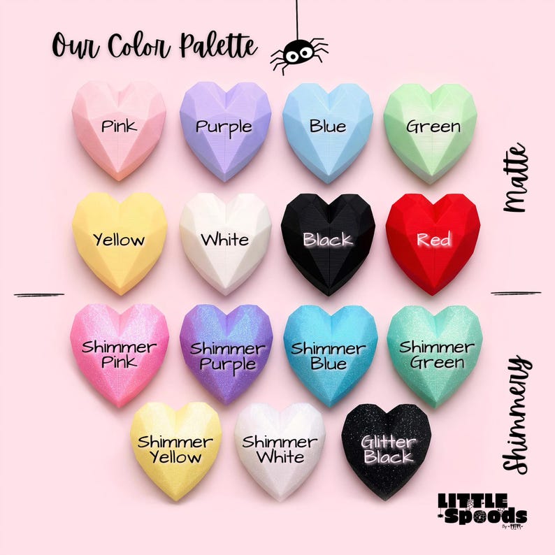 Jumping spider hide color chart showing matte and shimmer color options for little spoods jumping spider decor. Colors are displayed in heart shapes and include pastel pink, purple, blue, green, yellow, white, black, red and glitter colors