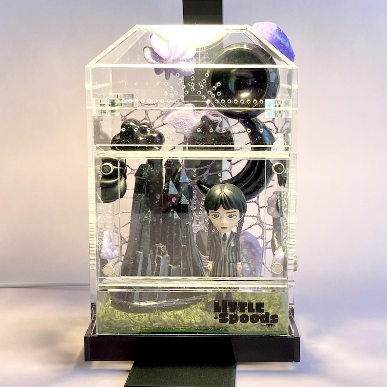 Gothic jumping spider enclosure displayed with optional Lumi light for illuminated spider habitat.