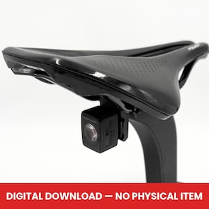 Puede incluir: Sillín de bicicleta negro con una luz trasera Bontrager adjunta. El sillín es brillante y tiene un diseño perforado. La luz es cuadrada y negra con una sola lente. La imagen tiene una pancarta roja en la parte inferior con el texto "DIGITAL DOWNLOAD - NO PHYSICAL ITEM".