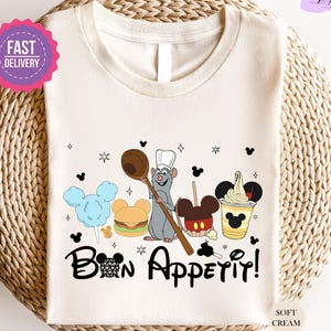 a white shirt with cartoon characters on it