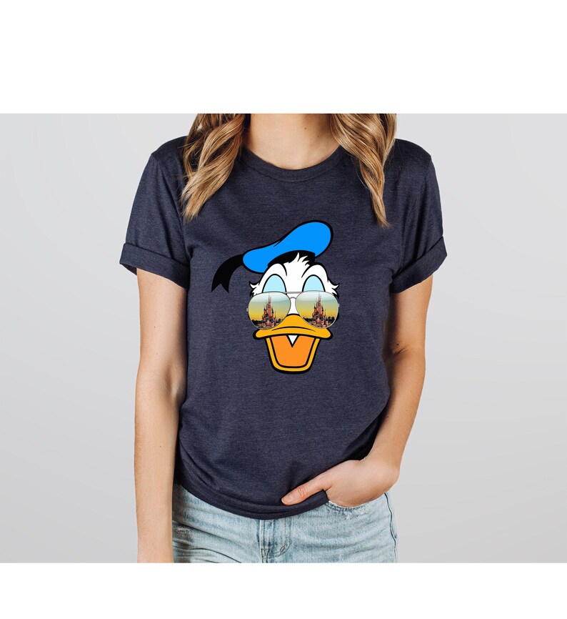 a woman wearing a donald duck t - shirt