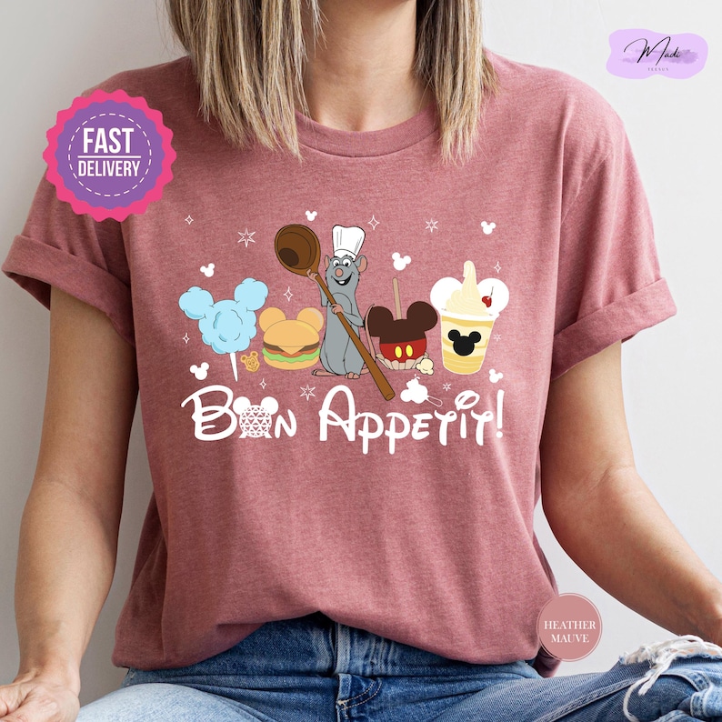 a woman wearing a t - shirt that says bon appetil