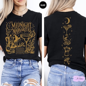 a woman wearing a black t-shirt with a graphic design on the front and back.