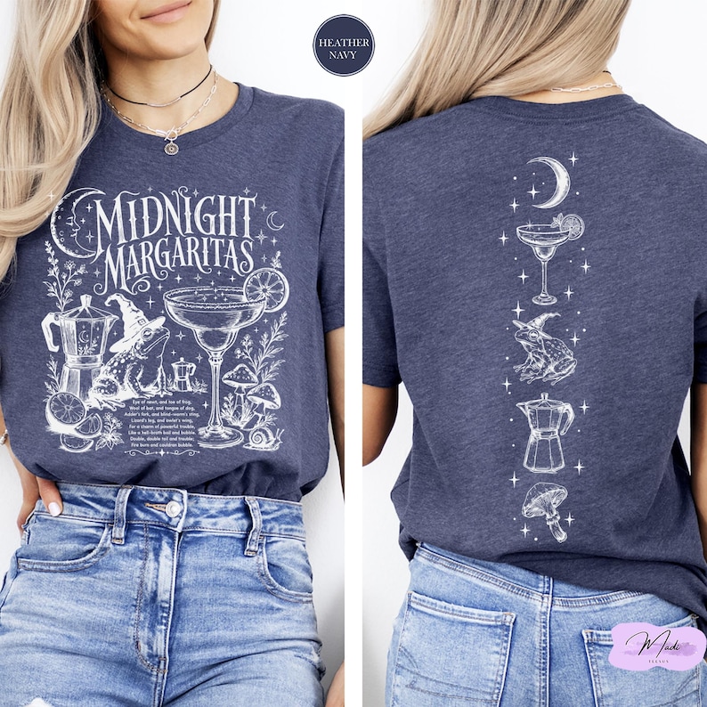 a woman wearing a blue t-shirt with a graphic design depicting a nighttime margarita scene.