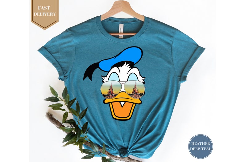 a t - shirt with a cartoon duck wearing sunglasses