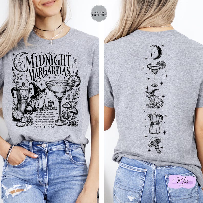 a woman wearing a gray t-shirt with a graphic design on the front and back.