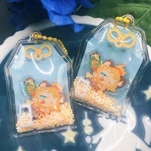 ruggie bucchi omamori shaker charm