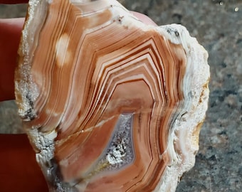 Polished Bahia River Agate: Orange Chevron Fortification with druzy center