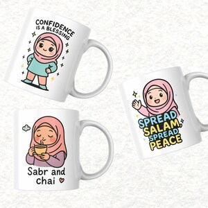 May include: Three white ceramic mugs with cartoon illustrations. One mug has a character with a pink hijab and the text "CONFIDENCE IS A BLESSING". Another mug says "SPREAD SALAM, SPREAD PEACE". The third mug says "Sabr and chai".