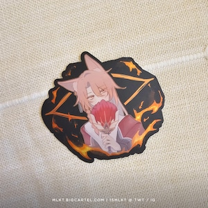 May include: A sticker featuring a cartoon character with pink hair and a red flower. The character is surrounded by flames and a black background. The sticker has the text "MLKT BIGCARTEL.COM | 15MLKT @ TWT / IG" at the bottom.