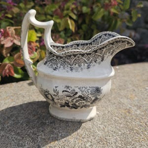 Antique Black Transferwear Creamer with &quot;22&quot; Marking, Stained, Crazed