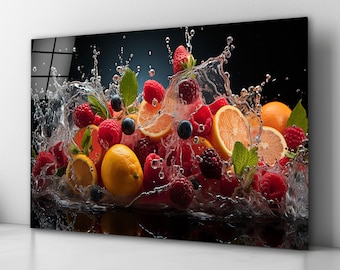 May include: A colorful mix of fresh fruit, including strawberries, raspberries, oranges, and lemons, is splashed with water, creating a vibrant and dynamic image.