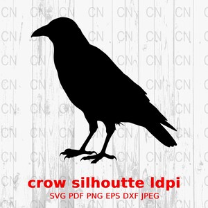 May include: A black crow silhouette on a white wood grain background. The crow is standing with its wings folded. Text at the bottom reads "crow silhouette ldpi" with file type options below.