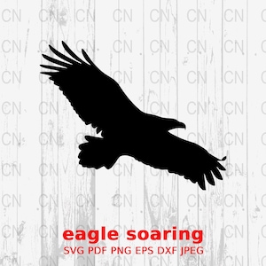 May include: A black silhouette of an eagle soaring in flight against a white woodgrain background. The image includes the text "eagle soaring" and "SVG PDF PNG EPS DXF JPEG".