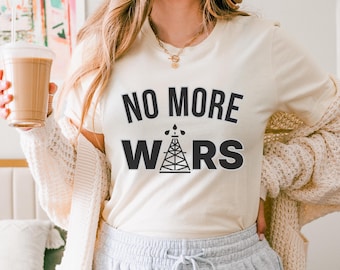 Camiseta "No más guerras", camiseta de protesta contra la guerra, camiseta gráfica "Alto a las guerras del petróleo", camiseta activista de izquierda anticapitalista, camiseta de paz "No a la guerra en Venezuela"