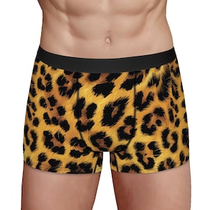 May include: Leopard print boxer shorts with a black waistband.
