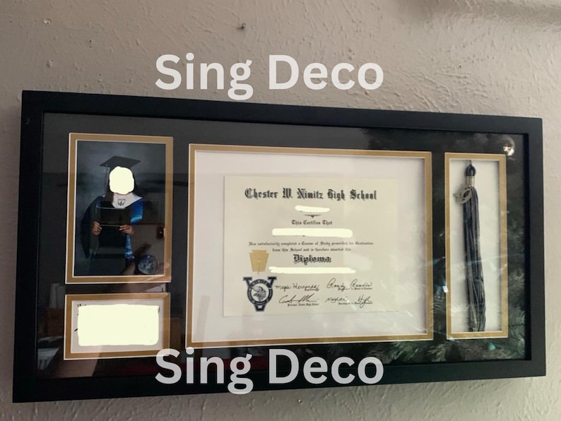 May include: A black framed diploma shadow box with a gold mat. The diploma is from Chester W. Nimitz High School. The box also includes a graduation photo and a tassel.