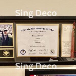 May include: A framed diploma from California State University, Fullerton, awarded to Julie Ann Hibbard for a Bachelor of Arts in Communications. The diploma is displayed with a graduation photo and a pink tassel.