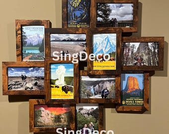 May include: A collage of 10 framed vintage National Park posters, featuring images of Rocky Mountain National Park, Jewel Cave National Monument, Grand Teton National Park, Yellowstone National Park, Mount Rushmore National Memorial, and Devils Tower National Monument. The frames are made of dark wood and are arranged in a heart shape.