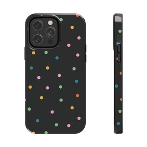 May include: Black phone case with a colourful polka dot pattern.