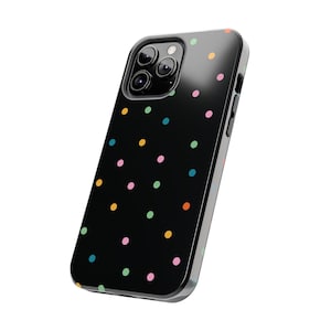 May include: A black phone case with a colourful polka dot pattern. The case has a clear, protective layer over the back and sides.