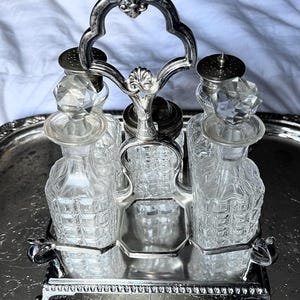 WM Rogers & Sons Silver Plated Cruet Caddy with 5 Cut Glass Condiment Containers