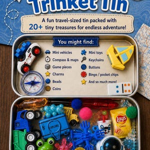 May include: A metal tin labeled Travel Trinket Tin containing over 20 small items including a blue toy truck, a green frog figure, a yellow school bus, a miniature Lay's chip bag, a white astronaut helmet, blue plastic connectors, and various beads.