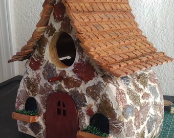 Stone cottage birdhouse