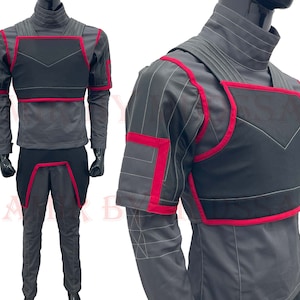 May include: A gray and black costume with red accents. The costume features a chest piece, shoulder pads, and pants.