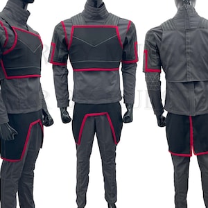May include: A gray and black costume with red accents. The costume features a long-sleeved shirt with a chest piece and matching pants. The pants have a red trim around the legs.