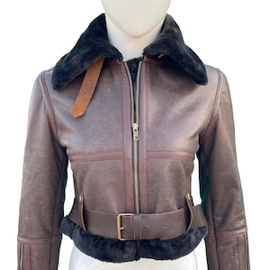 Veste vintage en fourrure de mouton retourné marron pour femme avec ceinture, veste courte chic en cuir de fourrure de mouton retourné marron