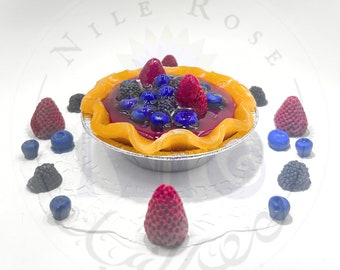 Deliciosa vela de pastel de bayas