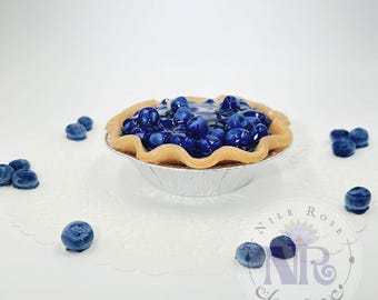 Deliciosa vela de pastel de arándanos