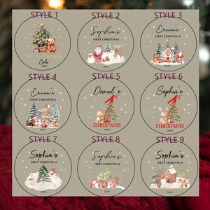 May include: Nine Christmas ornament designs with illustrations and text. Each ornament features a circular design with a festive theme, including Christmas trees, teddy bears, and snow-covered houses. The ornaments have names and the year 2025.