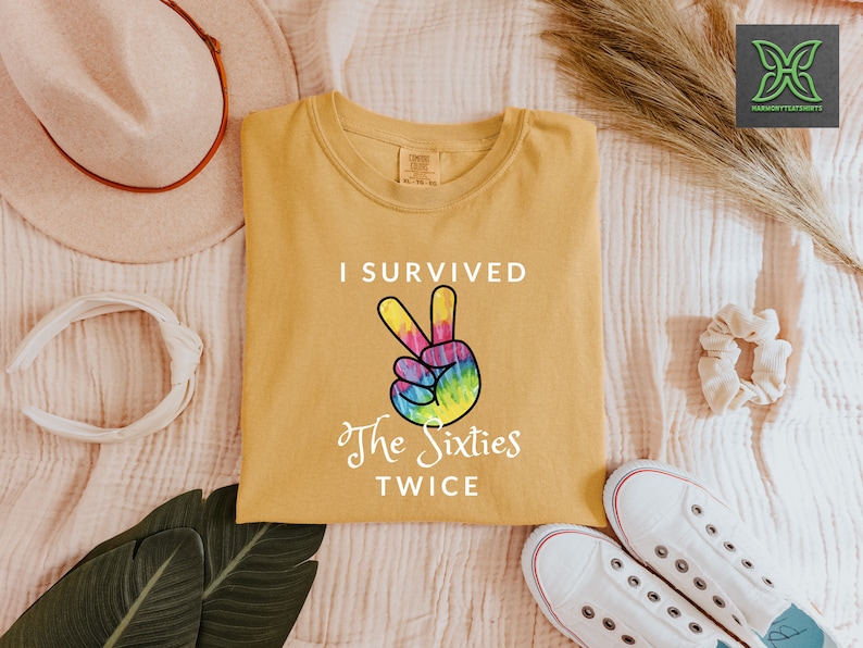 a t - shirt that says i survived the sixties twice