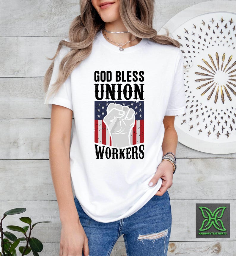 a woman wearing a white shirt that says god bless union workers