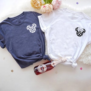 a couple of shirts that are on a table