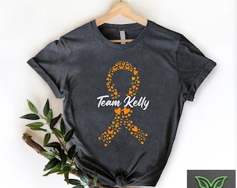 Personalized Leukemia Cancer Ribbon Support Shirt,Orange Ribbon Cancer Survivor Team Shirt,Kidney Cancer Warrior Tee,Leukemia Awareness Gift