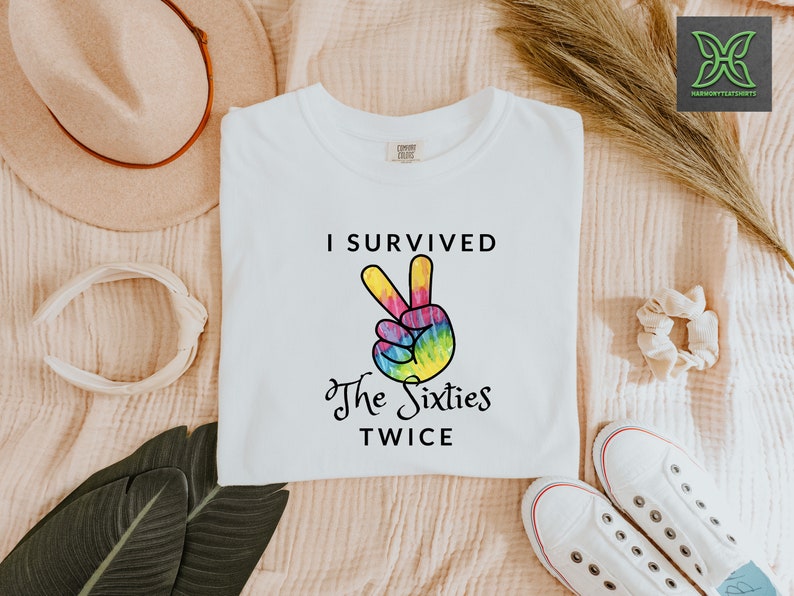 a t - shirt that says i survived the sixties twice
