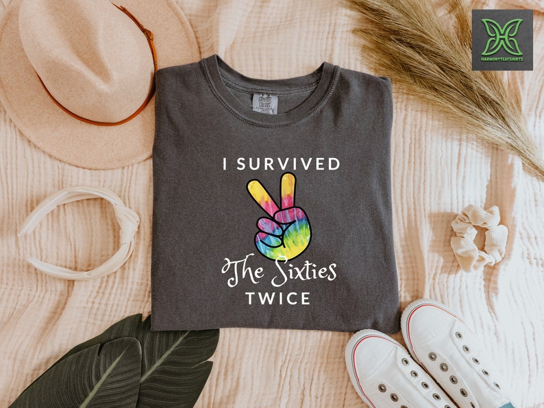 a t - shirt that says i survived the sixties twice