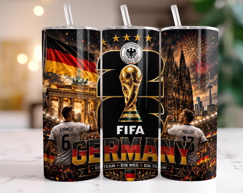 May include: A cylindrical tumbler with a straw featuring a German football theme. The design includes the German flag, the Brandenburg Gate, the Cologne Cathedral, the FIFA World Cup trophy, and players Kimmich and M&uuml;ller. Text includes FIFA, GERMANY, and EIN TEAM EIN WEG EIN TRAUM.