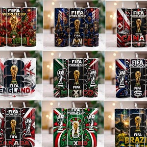 May include: A collection of nine cylindrical tumblers featuring FIFA World Cup 2026 branding. Each tumbler displays a unique national theme, including Portugal, France, Canada, England, Mexico, USA, and Brazil, with the gold trophy and text.