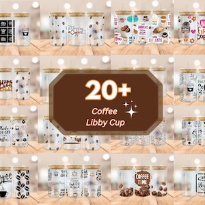 May include: A collection of 20+ coffee-themed glass Libby cups with various designs and sayings. The cups have a clear glass body with a gold lid and a straw. Some of the designs include coffee beans, coffee cups, and text such as "Morning Coffee", "Coffee Time", and "But First Coffee".