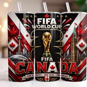 May include: A cylindrical tumbler with a straw featuring a FIFA World Cup graphic, the CN Tower, the Canadian Parliament building, red maple leaves, and the text FIFA WORLD CUP CANADA ONE COUNTRY ONE TEAM ONE DREAM in red, white, and black.